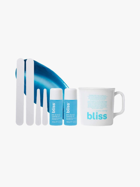 Bliss Poetic Waxing At Home Wax Kit in multiple branded components on a light gray background